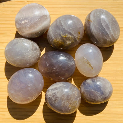 Ethically sourced Grade A Blue Rose Quartz palm stone from Alaotra-Mangoro, Madagascar at Beyond Bohemian