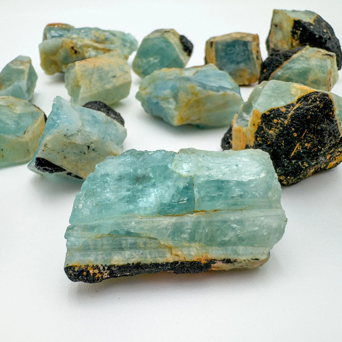 Lateral view of Black Tourmaline raw stone, showing honest grain.