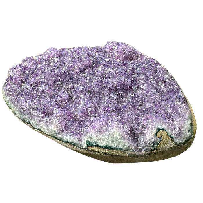 Palm-scale view of one Amethyst raw geode for scale, from Artigas, Uruguay.
