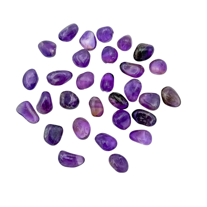 Tight crop on a single Ametrine tumble from Bolivia, untreated natural colour