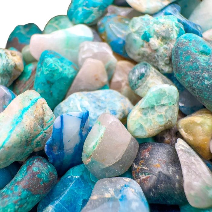 Top-side view of Chrysocolla polished chip, showing natural inclusions.