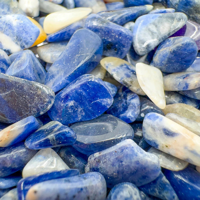 Side angle of Sodalite polished chip, showing glassy finish.