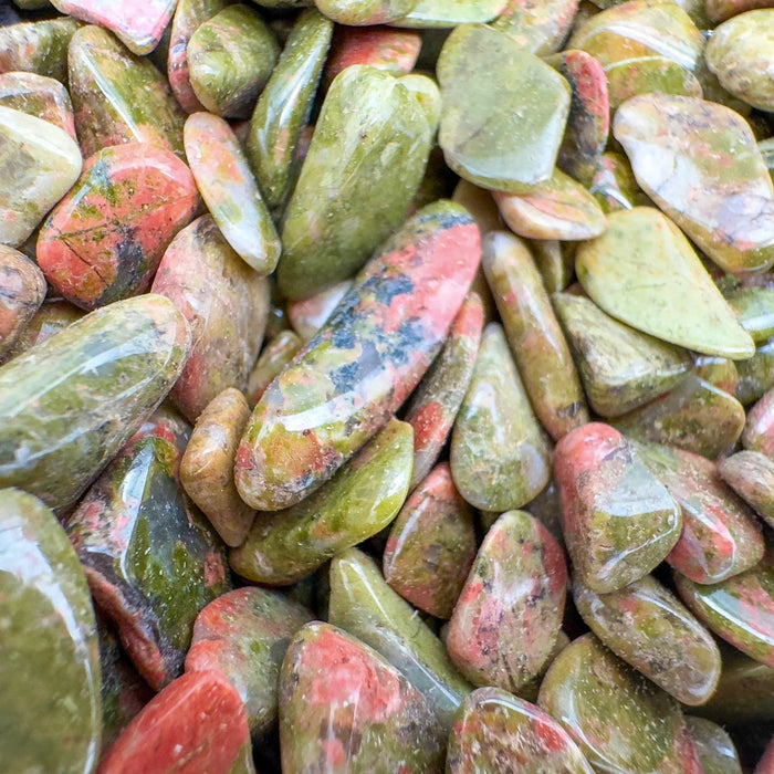 Top view of Grade A Unakite polished chip, showing subtle veining, associated with Emotional Healing.