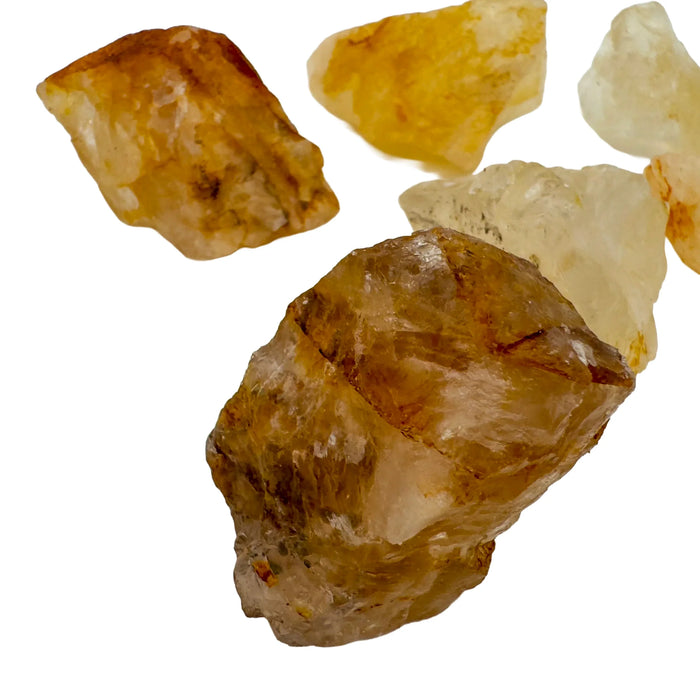 Top-down shot of Grade AA Golden Healer raw stone, Brazil-sourced, showing characteristic finish.