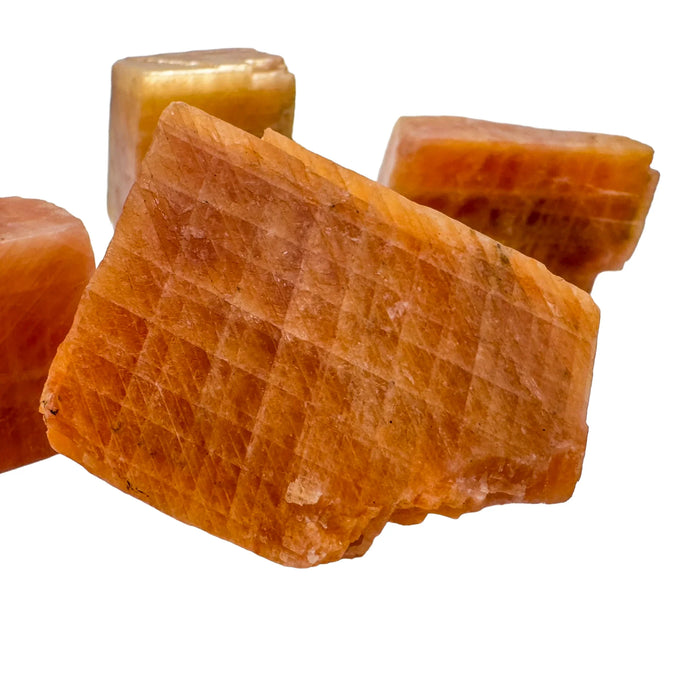Alternate angle of Grade AA Orange Calcite raw stone, associated with Energy and Creativity.