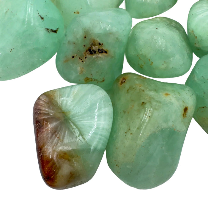 Top view of green Prehnite tumbled stone, sourced from Namibia.