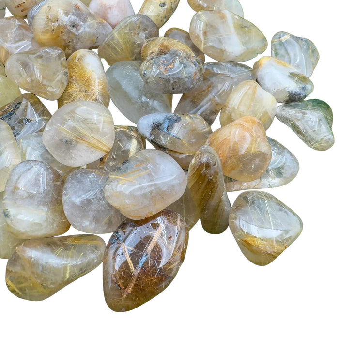 Side angle of clear Quartz tumbled stone, showing soft luster, from Brazil.