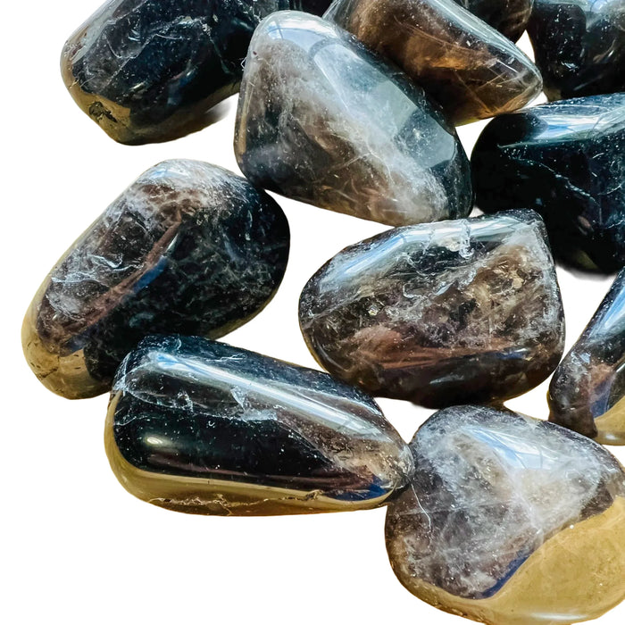 Side profile of Smoky Quartz tumbled stone, drawn on for Grounding.