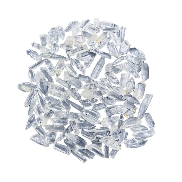 Lemurian Quartz points laid out flat, 2 to 10 grams each, ladder-like growth striations visible across the faces.