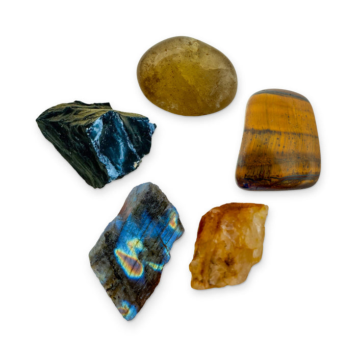 Leo Crystal Kit: natural citrine, tiger eye, golden healer, labradorite and black onyx, shown together on white