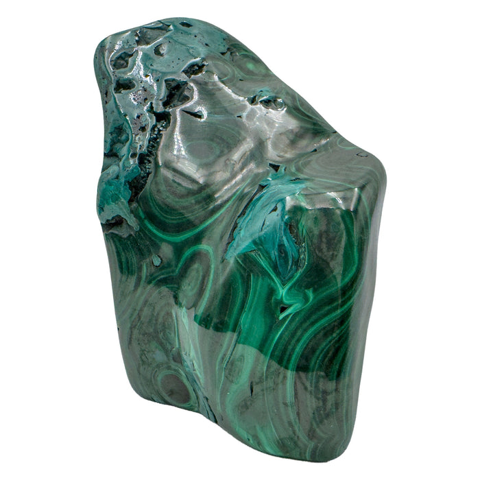 Vertical view of the malachite specimen with a raw patch at the crown and rings of banding through the middle.