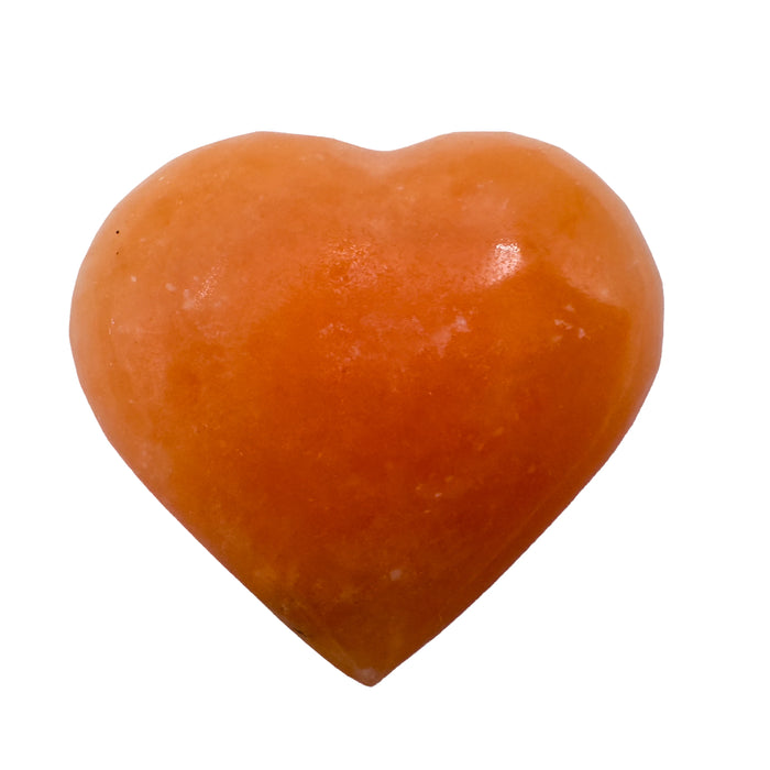 Detail view of AA Grade Orange Calcite polished heart from Madagascar