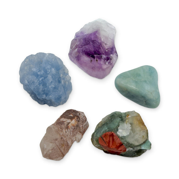 Pisces Crystal Kit: amethyst point, aquamarine, bloodstone, lithium quartz point and blue calcite, shown together on white