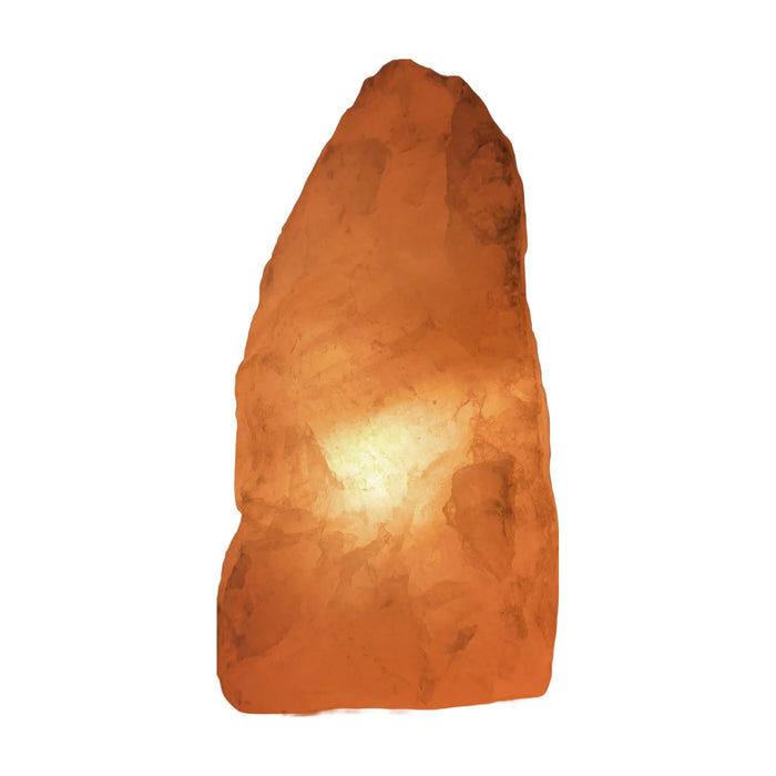 Rose quartz crystal lamp lit, warm illumination, further view
