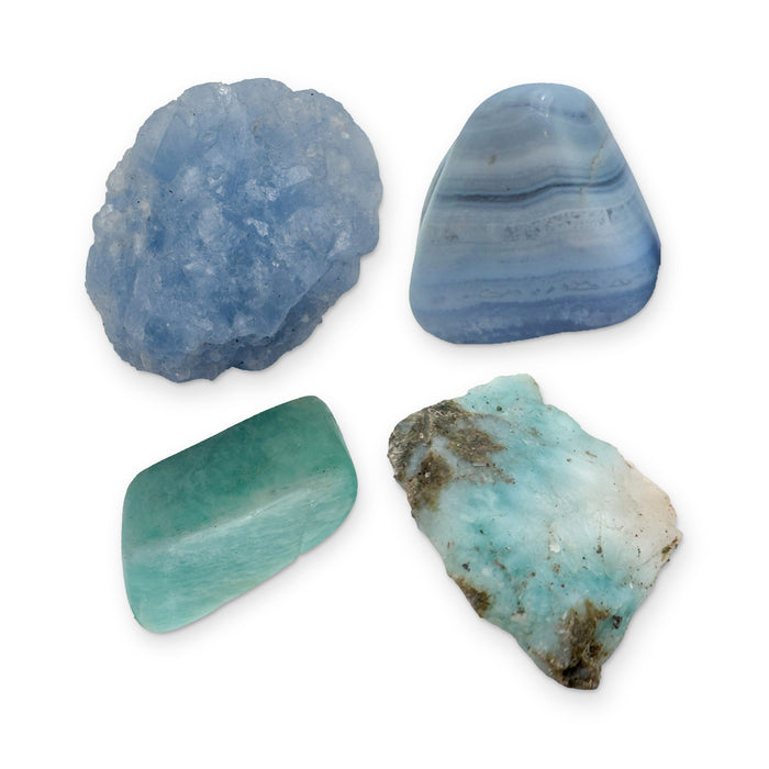 Throat Chakra Crystal Kit: blue lace agate, larimar, amazonite and blue calcite, shown together on white