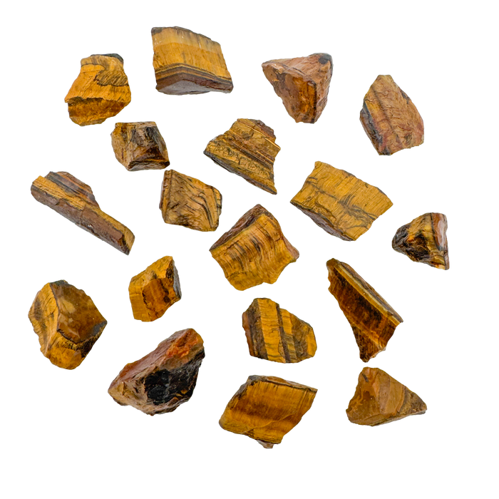 Tiger Eye raw stones scattered flat lay, A grade golden brown rough from Northern Cape South Africa, 1 to 2 inch