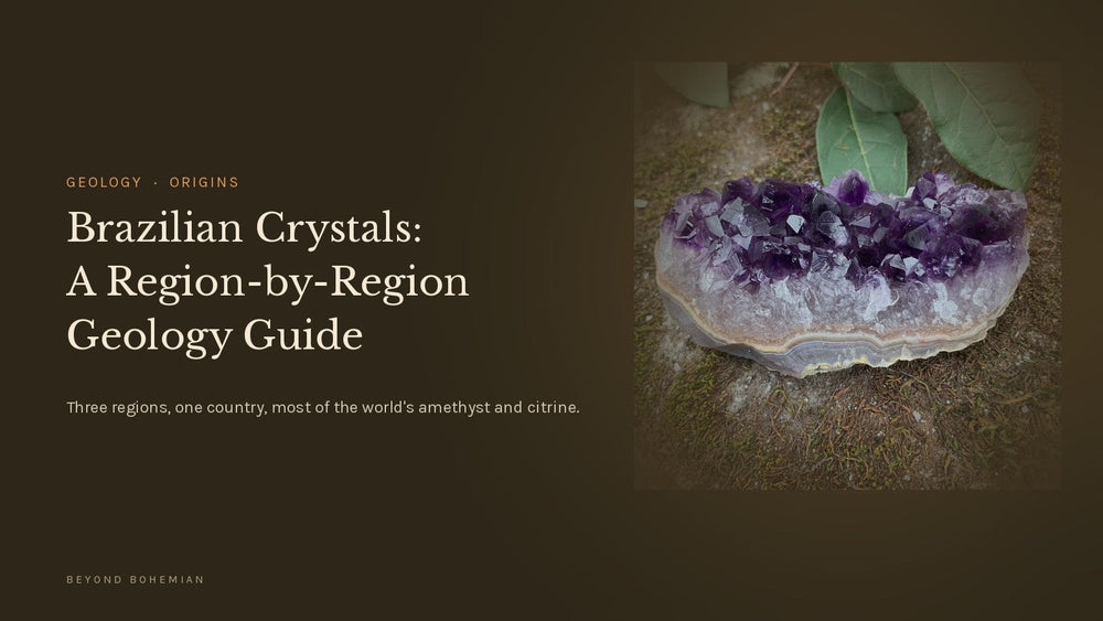 Brazilian raw amethyst cluster on dark moody backdrop for the Beyond Bohemian region-by-region geology guide to Brazilian crystals