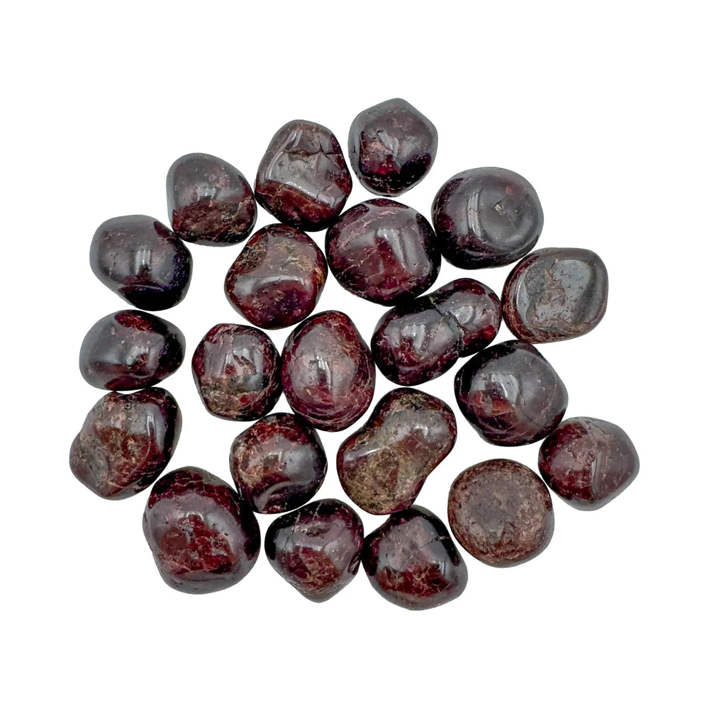Tumbled garnet stones for an article on crystals for Capricorn