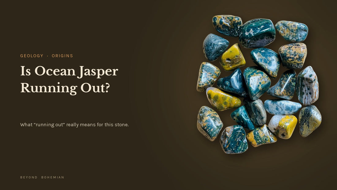 Ocean jasper tumbled stones from Madagascar showing green, yellow, and blue orbicular patterns on a dark backdrop, for an article on whether ocean jasper is running out