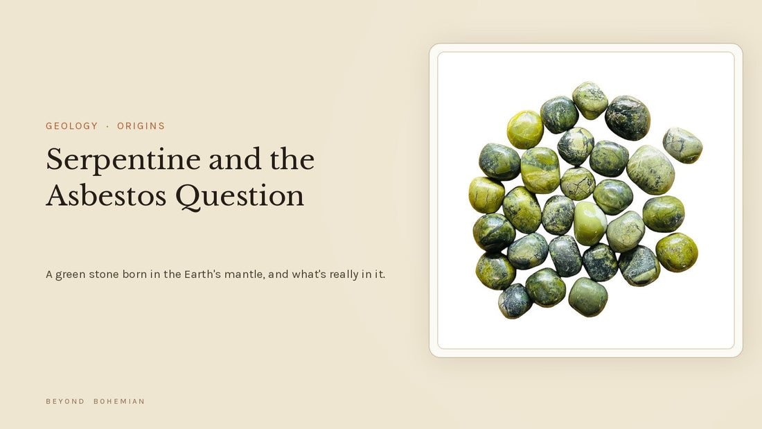 Green serpentine tumbled stones on a warm linen background for an article on serpentine and the asbestos question