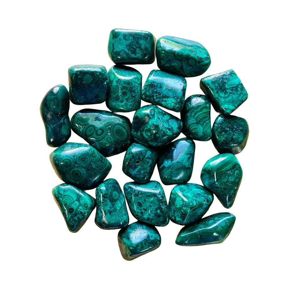 Polished malachite stones for an article on crystals for Scorpio