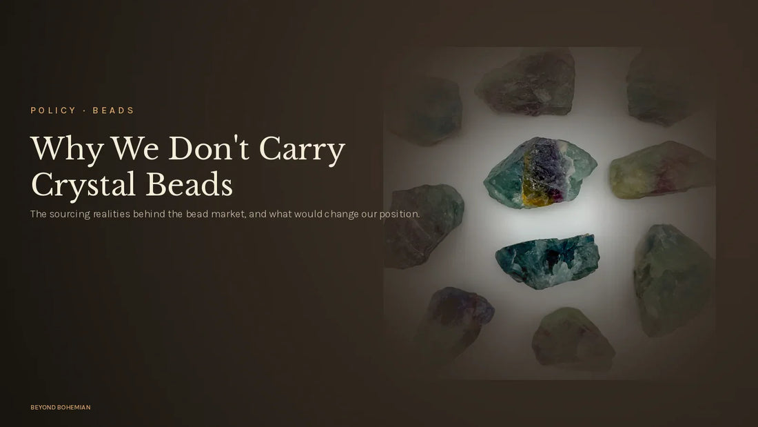 Raw fluorite crystal on dark moody backdrop for why we don't carry crystal beads article