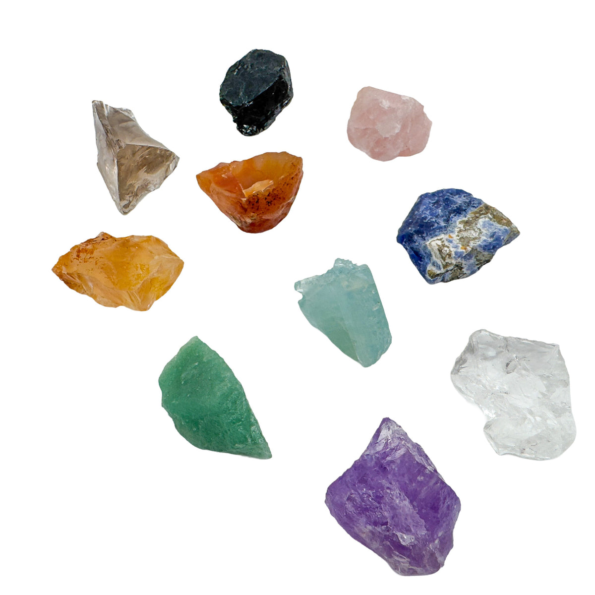 Ten rough Brazilian crystals overhead, showing surface texture and matrix