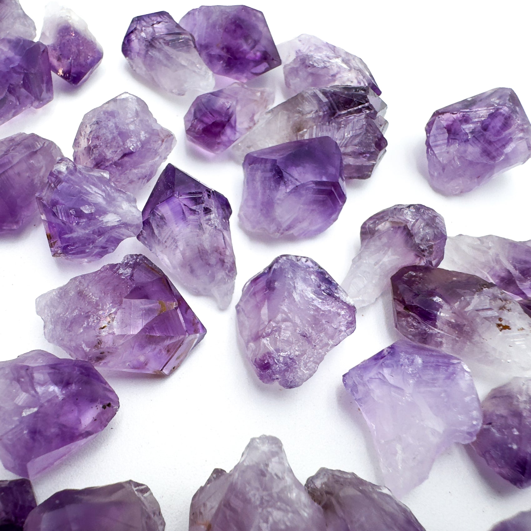 Bottom side of Amethyst raw point, sourced from Brazil, showing tight grain.