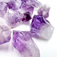 Side perspective of Amethyst raw point, sourced from Rio Grande do Sul, Brazil.