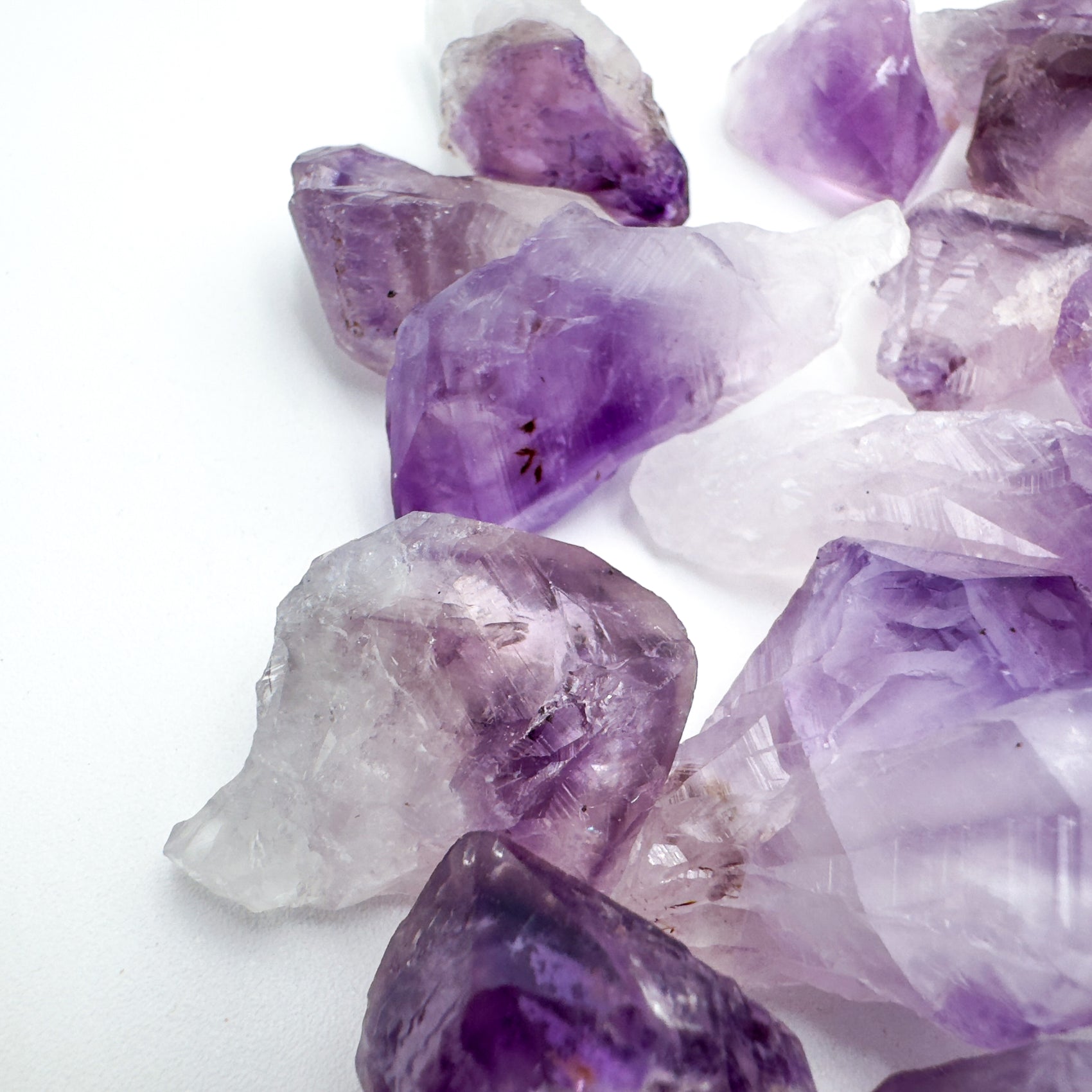 Underside view of Grade AA purple Amethyst raw point, Brazil-sourced.