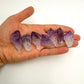 Tabletop view of Amethyst raw crystal, from Rio Grande do Sul, Brazil, often kept for Meditation, shown in a calm studio setting.