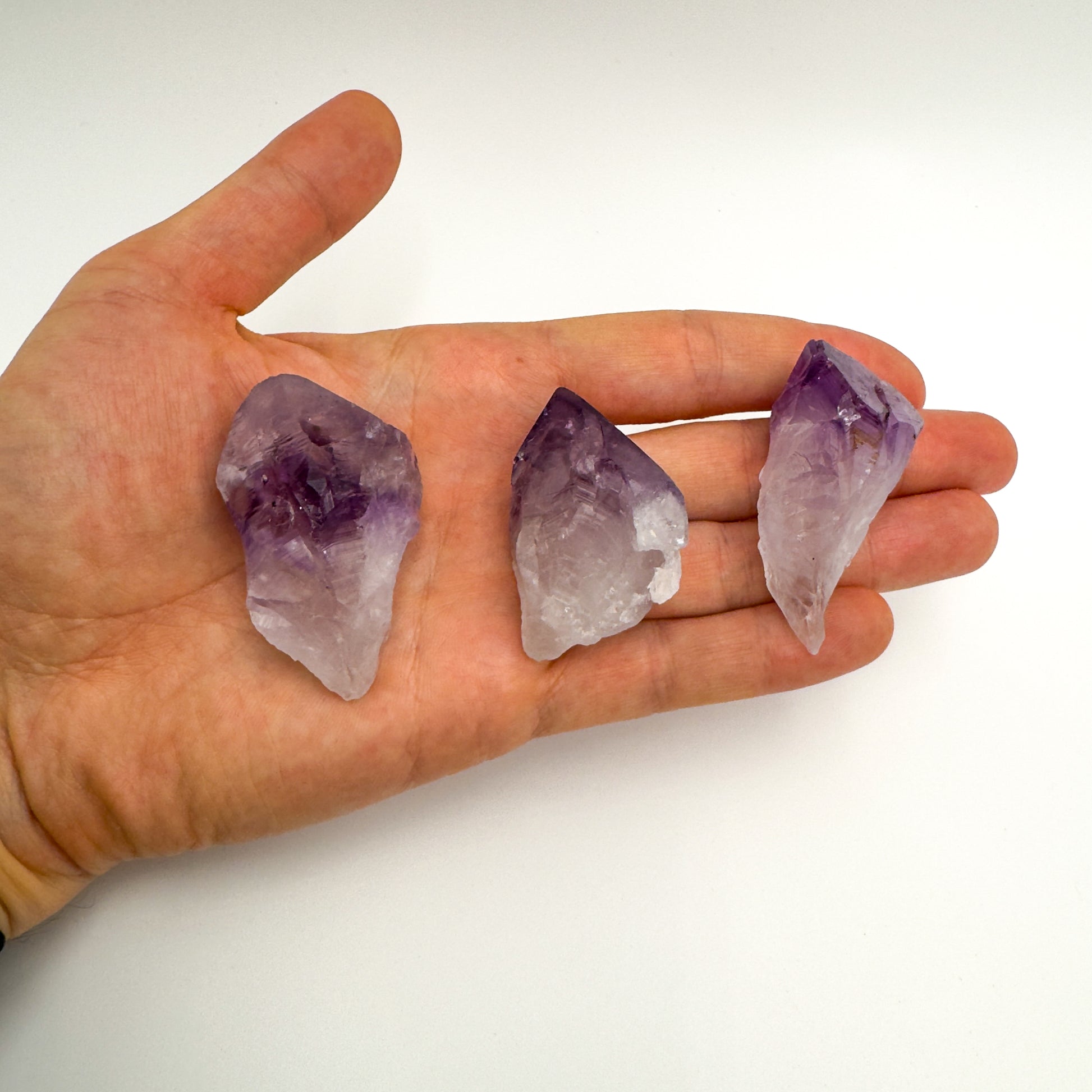 Scale comparison of Amethyst raw crystal, from Rio Grande do Sul, Brazil, showing natural surface character.