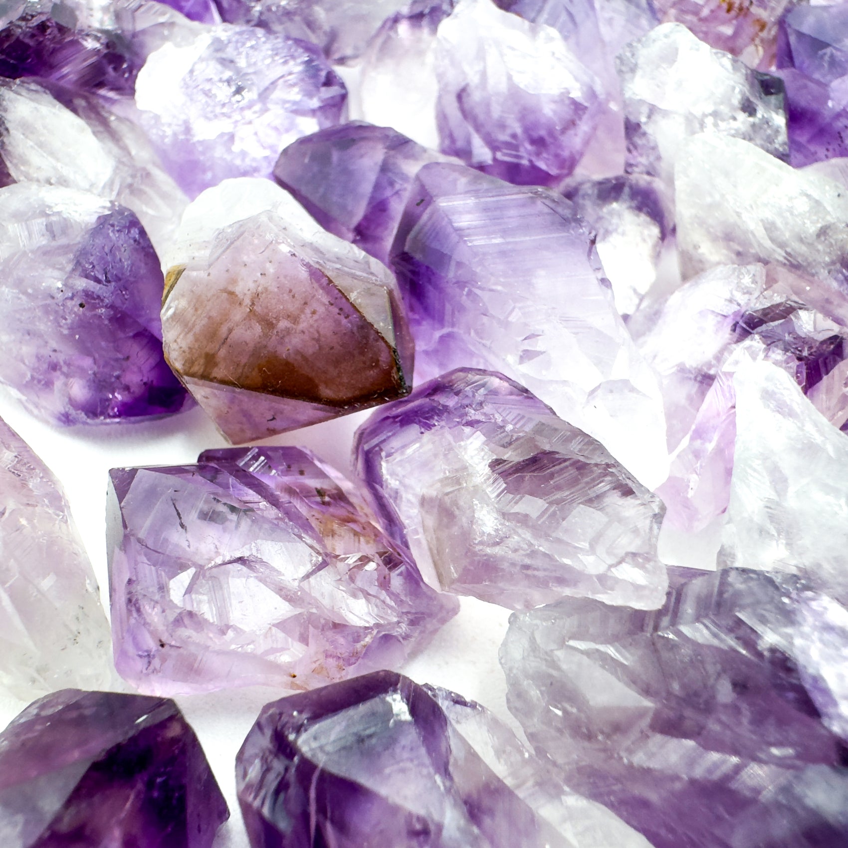 Top-side view of Amethyst raw point, drawn on for Stress Relief.