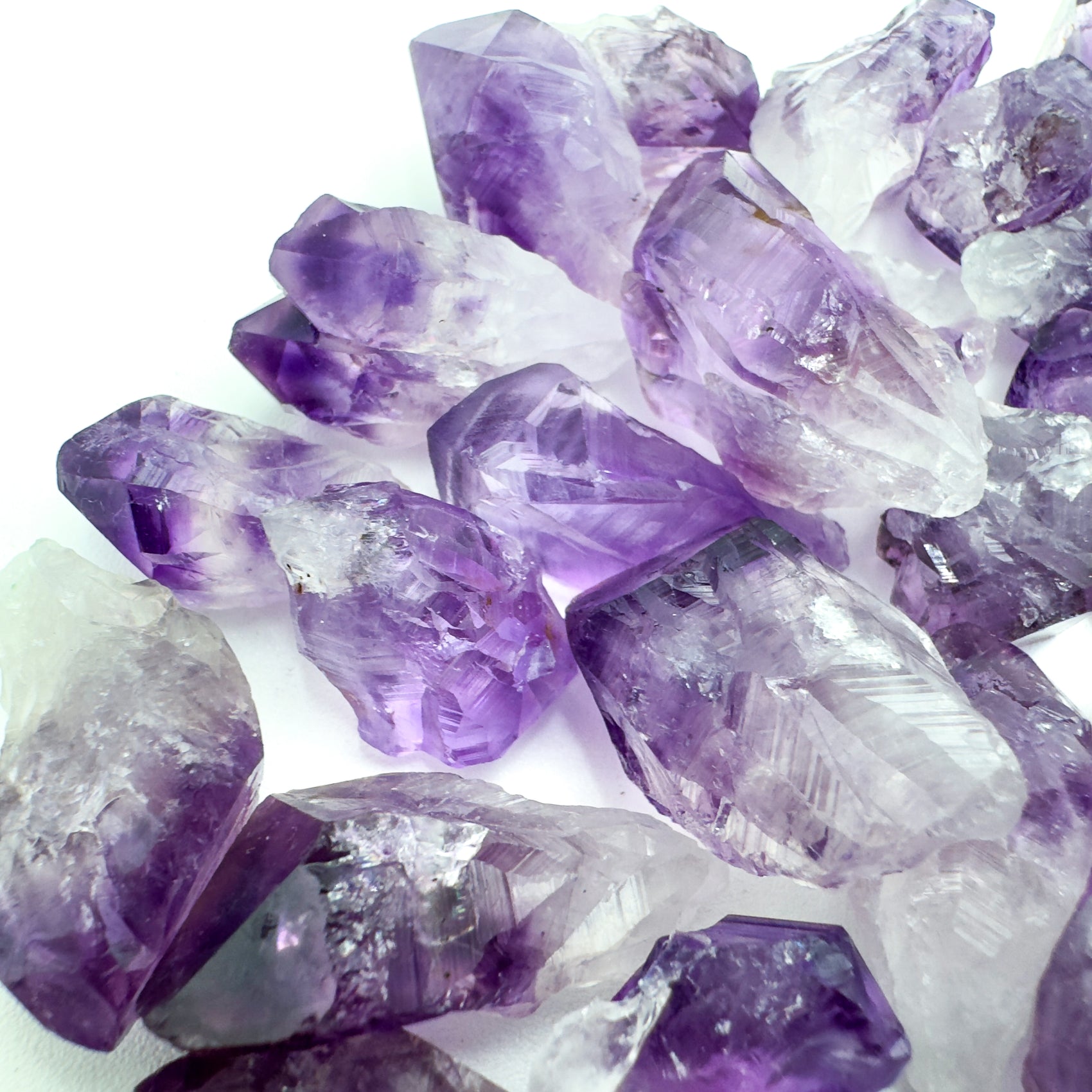 Alternate angle of Grade AAA Amethyst raw point, showing natural variation.
