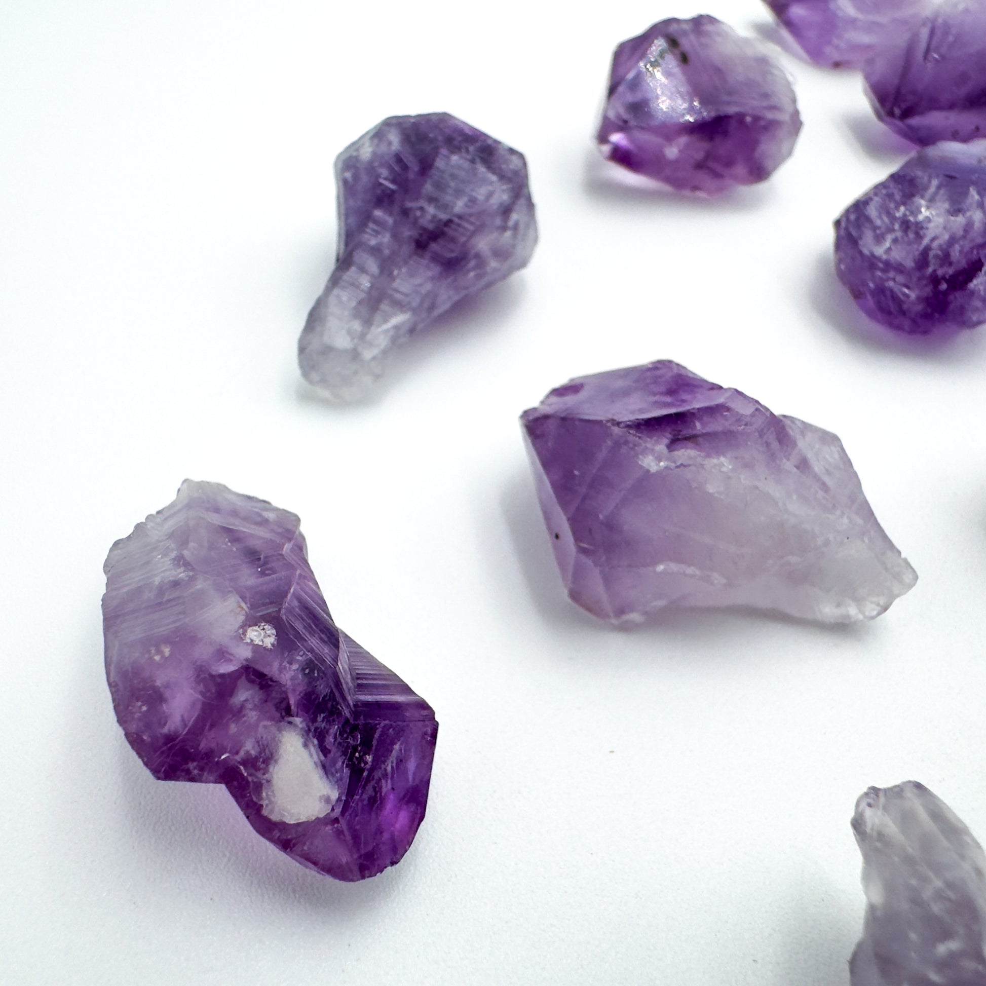 Bottom side of purple Amethyst raw point, showing natural form.