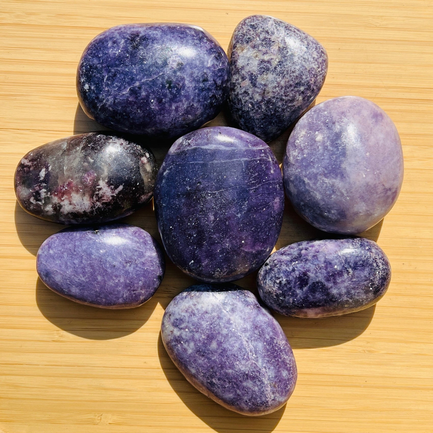 Lepidolite palm stone in Purple, Pink tones, ethically sourced from Madagascar for Emotional Healing and Stress Relief