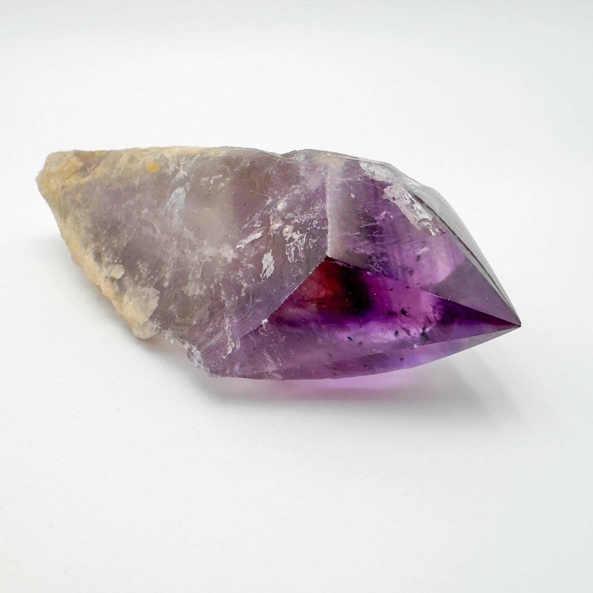 Underside detail of Amethyst polished point, showing natural sheen, Brazil-sourced.
