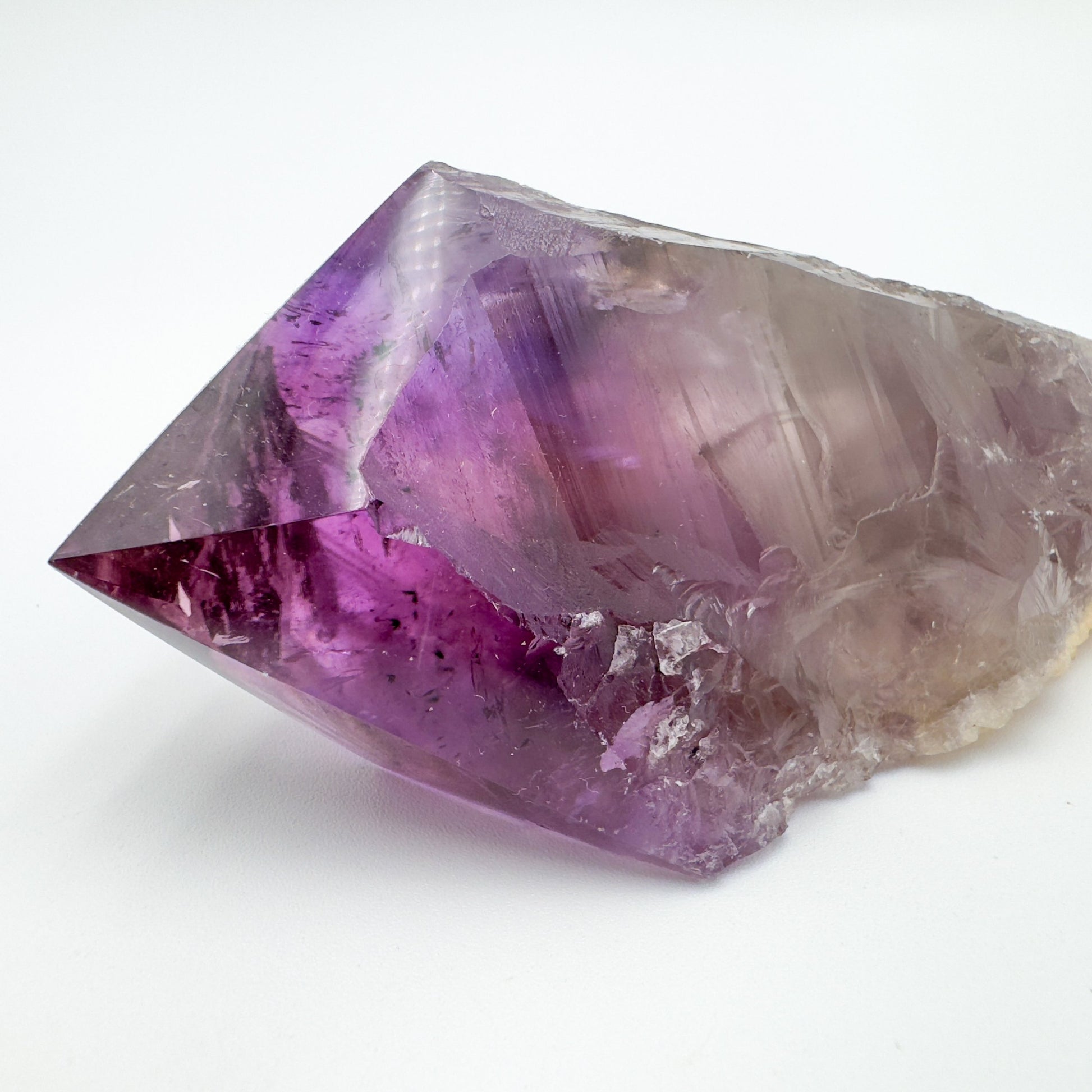 Composed shot of Amethyst stone, with form visible in context.