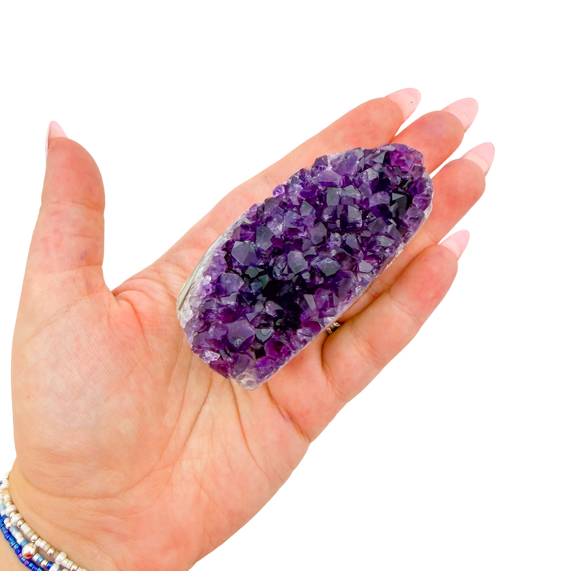 AA-grade amethyst polished geode no. 101 from Artigas, Uruguay, cut base, violet druzy interior on a cut base, 2.81 inches tall.