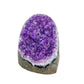 AA-grade amethyst polished geode no. 103 from Artigas, Uruguay, reverse side, violet druzy interior on a cut base, 3.04 inches tall.