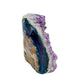Right profile of a 0.72 pound amethyst geode, no. 105, deep purple crystal lining a polished grey agate rind.