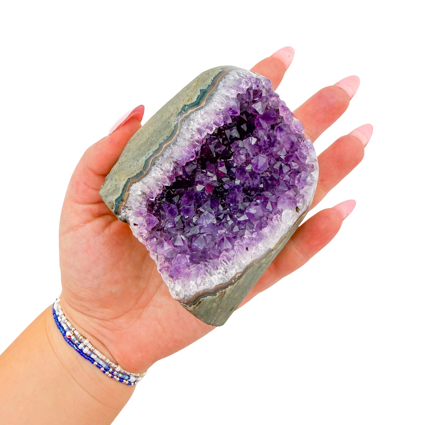 Cut base of AA amethyst geode no. 106, 2.84 inches across the polished face, natural and untreated.
