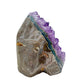 The right profile of amethyst geode no. 107, 3.16 inches of violet druzy standing on a flat cut base.