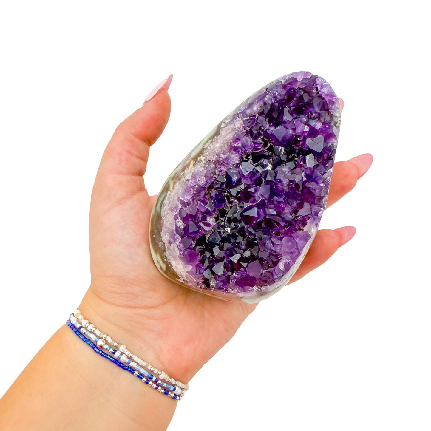 AA-grade amethyst polished geode no. 108 from Artigas, Uruguay, cut base, violet druzy interior on a cut base, 3.48 inches tall.