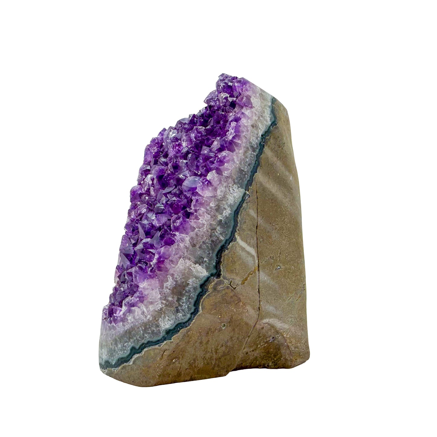 Angled three-quarter view of AA amethyst geode no. 111, 3.64 inches across the polished face, natural and untreated.
