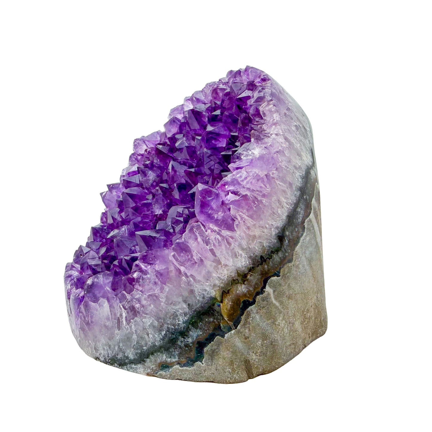 AA-grade amethyst polished geode no. 113 from Artigas, Uruguay, angled three-quarter view, violet druzy interior on a cut base, 3.44 inches tall.