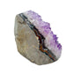 Polished amethyst geode no. 113 photographed at the right profile, measuring 4.00 by 3.49 by 3.44 inches, Uruguayan AA grade.