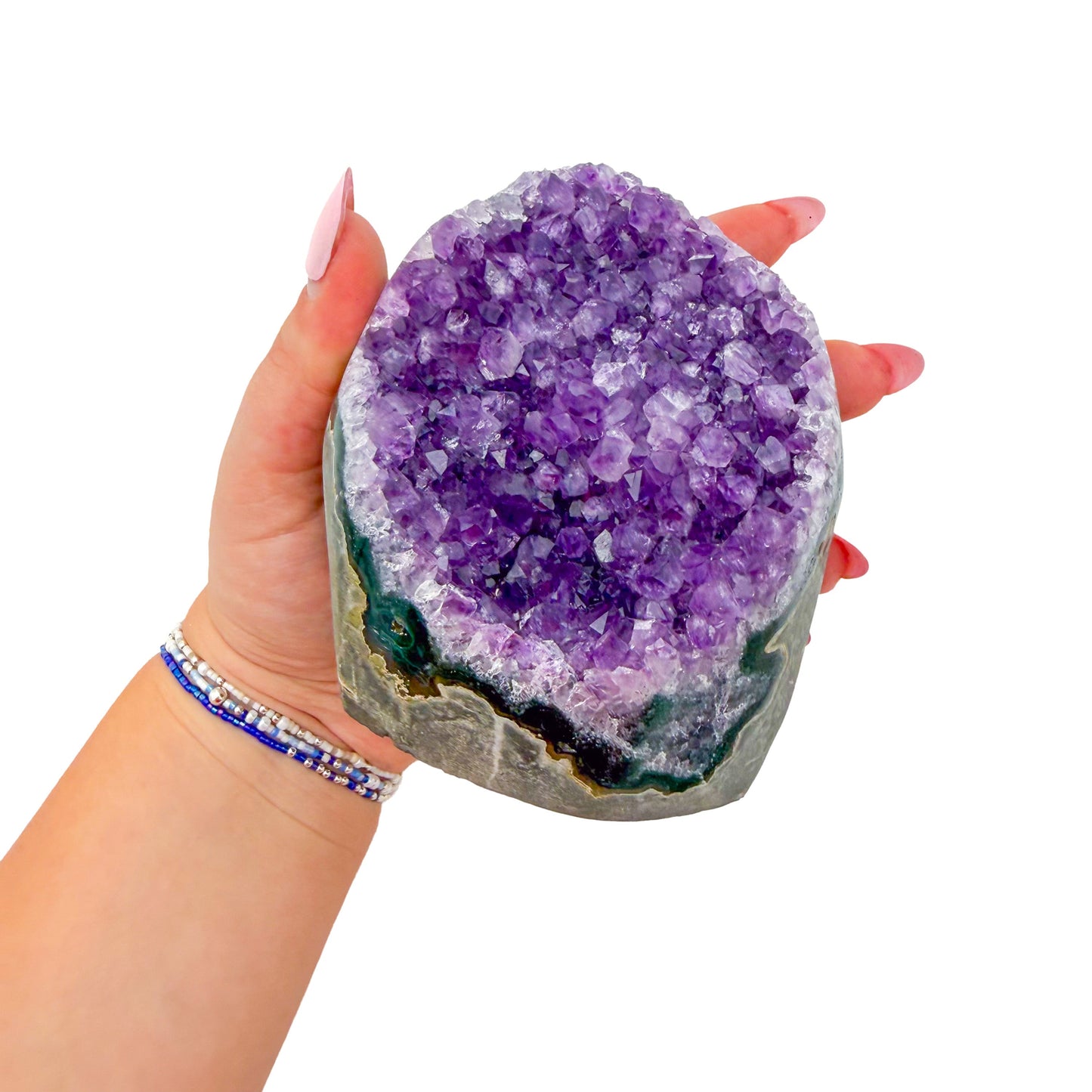 Uruguayan amethyst geode no. 114 at the cut base, violet crystal interior framed by its polished agate shell, 1.84 lb.