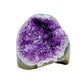 Primary crystal face of a 3.41 pound amethyst geode, no. 115, deep purple crystal lining a polished grey agate rind.