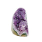 AA-grade amethyst polished geode no. 117 from Artigas, Uruguay, reverse side, violet druzy interior on a cut base, 3.94 inches tall.